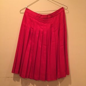 Red, pleated skirt